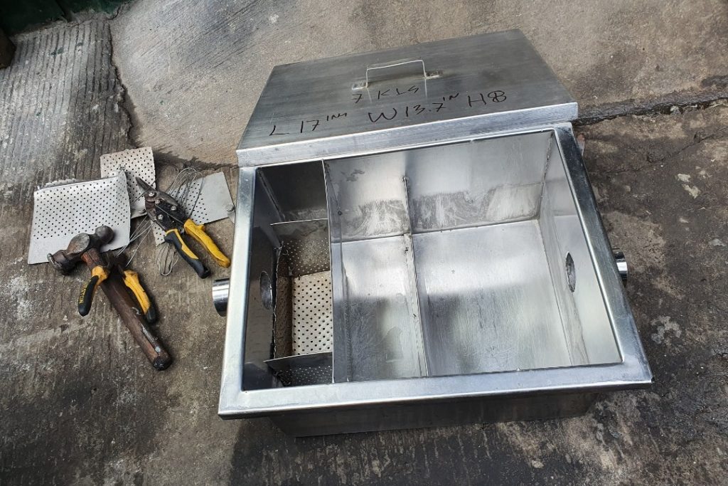 Grease Trap Cleaning Keeps Your Commercial Kitchen Running Smoothly